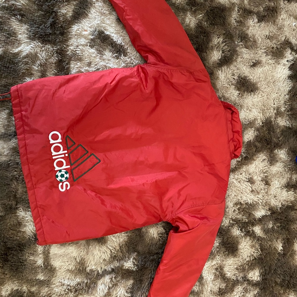 Red “Adidas” jacket